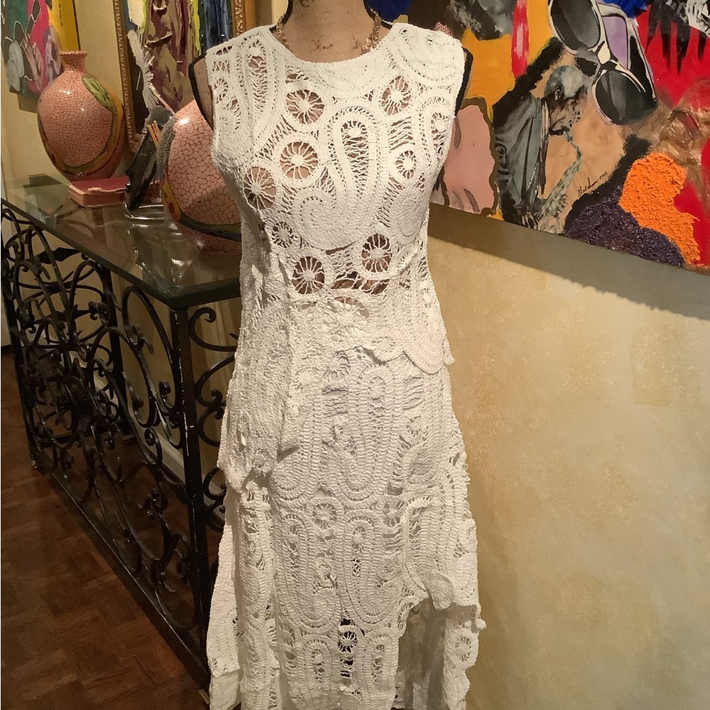 Asymmetric scalloped crochet top and skirt set.